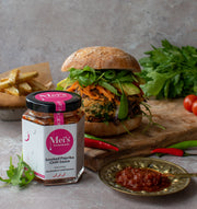 Mei's homemade Smoked Paprika Chilli Sauce serves as a relish on vegan burger , grated carrots, rocket salads and plate of chips