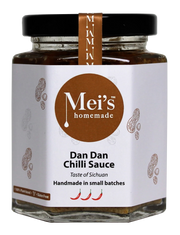 Jar of Mei's homemade Dan Dan Chilli Sauce with a white label and brown accents.