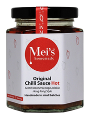 A glass jar of Mei's Homemade Original Chilli Sauce HOT with a red label, indicating it is gluten free.