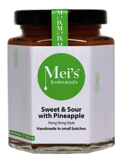 A jar of Mei's Sweet and Sour Stir Fry with Pineapple. The label is green and white with the text 'Mei's Homemade' and the product name clearly stated.