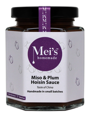 A glass jar of Mei's Homemade Miso & Plum Hoisin Sauce with a purple label, indicating it is gluten free.
